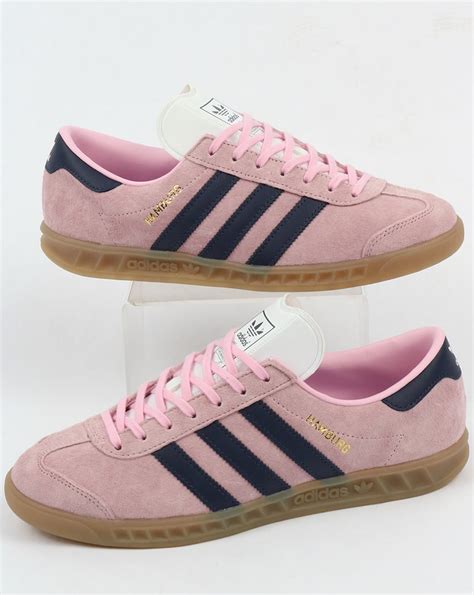 pink and blue adidas sneakers.